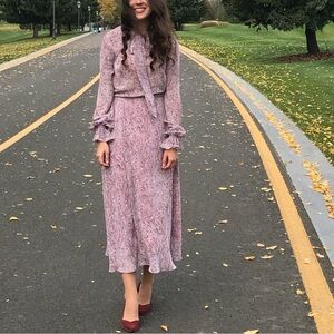 Elegant pastel pink dress in excellent condition, size S.